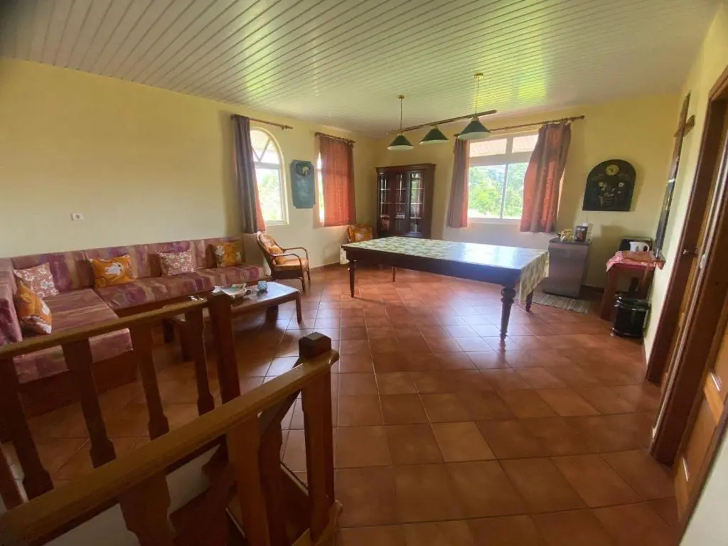 Spacious living area with pool table